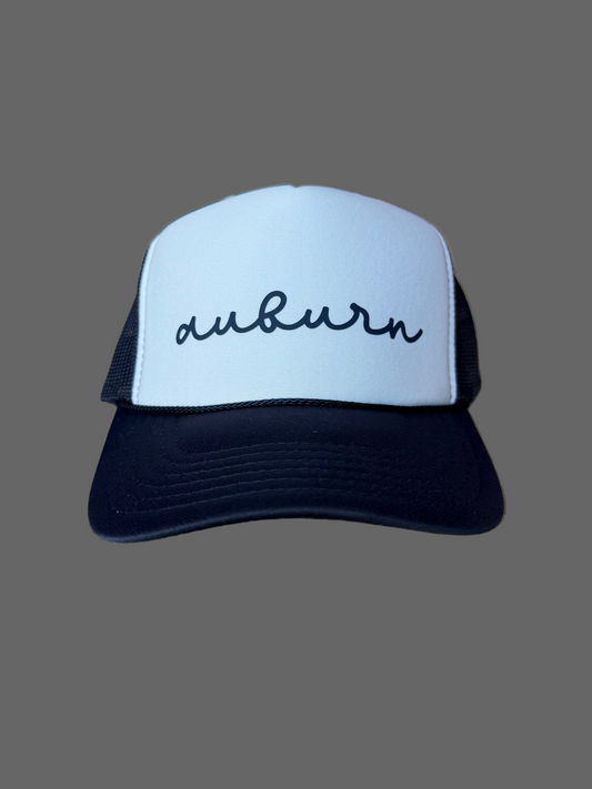 Cursive "auburn"